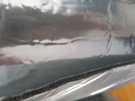 בין יריעות האלומיניום חומר פטנט לבידוד אקוסטי ותרמי 